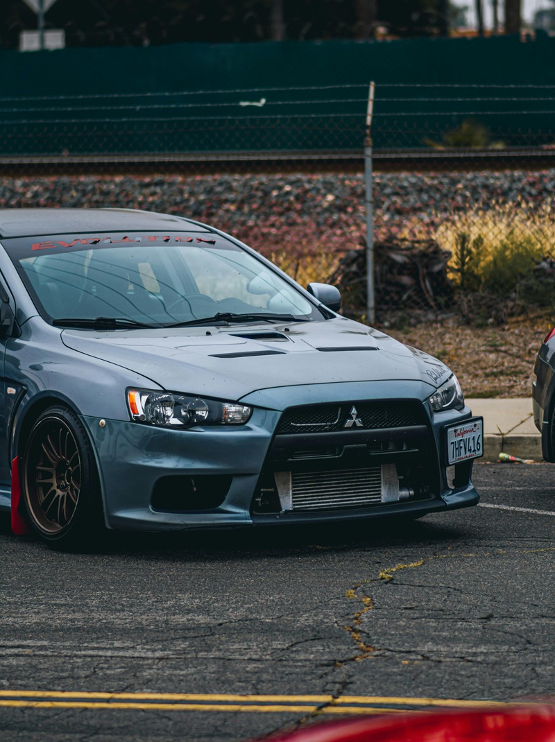 Sports car upgraded with visual and engine tuning modifications